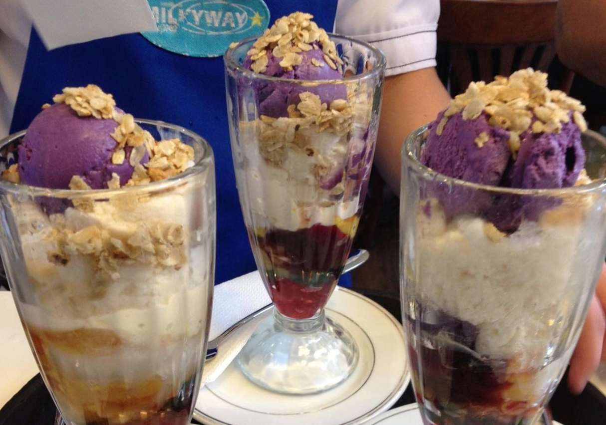 halohalos served in parfait glasses on a tray