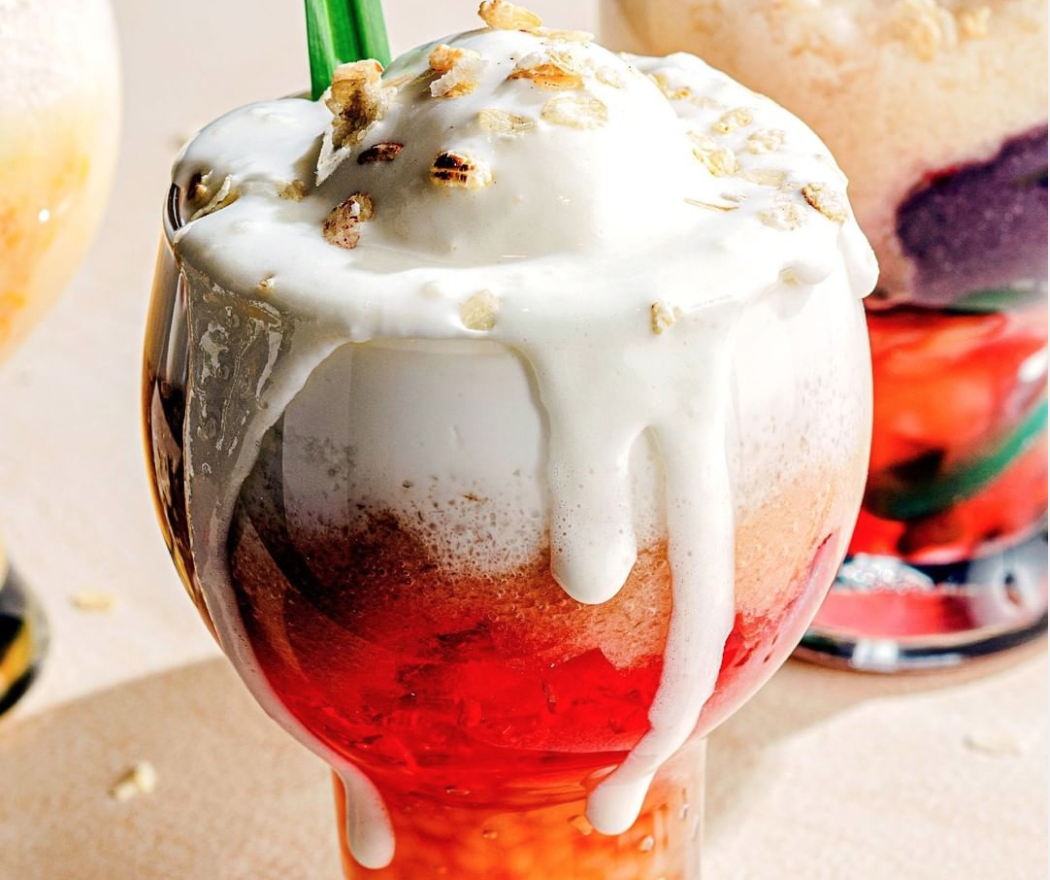 Shaved ice with red jelly topped with coconut